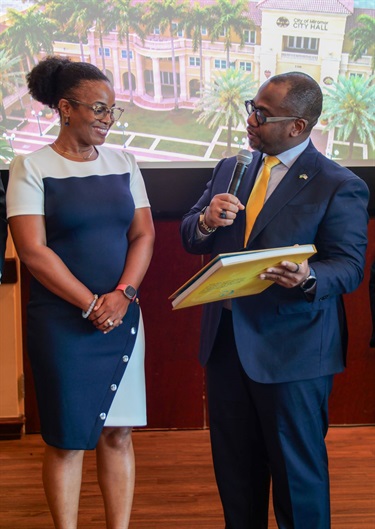 Consul-General-Tyson-K.-McKenzie-and-Commissioner-Cherasard_presentation 