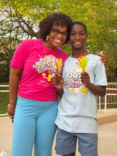 Commissioner-Cherasard-and-her-son-Jay-R