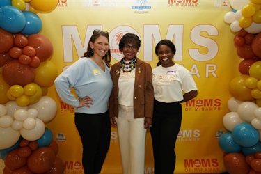 Commissioner-Cherasard-and-event-attendees-at-January-Moms-of-Miramar-event