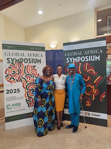 Commissioner Cherasard and event goer at Global Africa Symposium