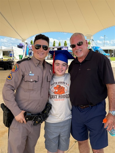 Celebrating-a-student’s-accomplishment-at-Grad-Bash