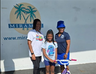 Commissioner Cherasard with event goers at Play-it Safe Palooza