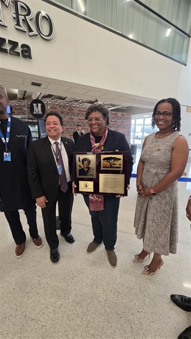 Commissioner-Cherasard-and-Her-Excellency-Mia-Amor-Mottley.jpg