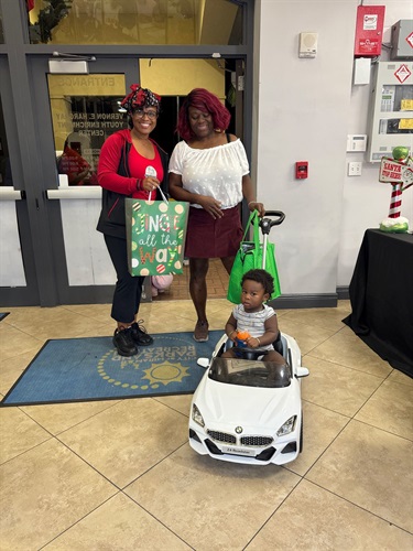 Commissioner-Cherasard-and-Miramar-Family-Enjoying-Toy-Drive