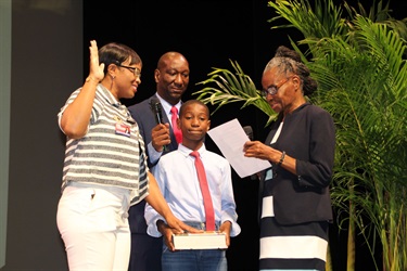 Commissioner Cherasard Taking the Oath