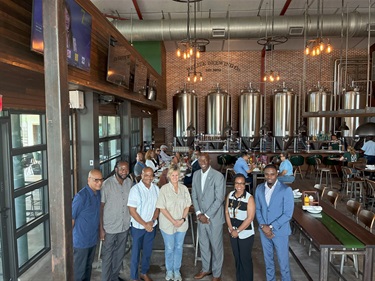 Commissioner Cherasard Mayor Messum in Belize on Brewery Tour